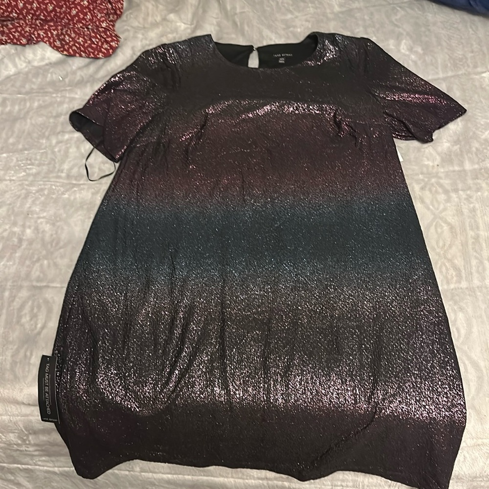 Beautiful purple and blue dress comes down mid leg